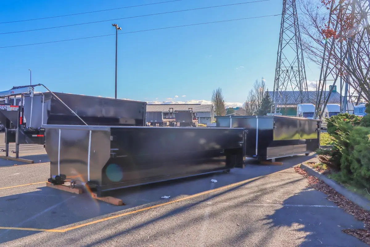 Roll-off dumpster ready for waste disposal at job site for Roofing Dumpster Rental in Belleville